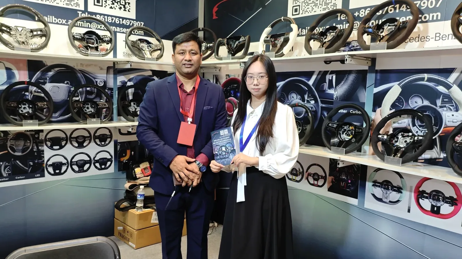VELMORA steering wheel display at a trade show booth